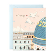 Bird flying over Paris Rooftops love greeting card by JooJoo Paper