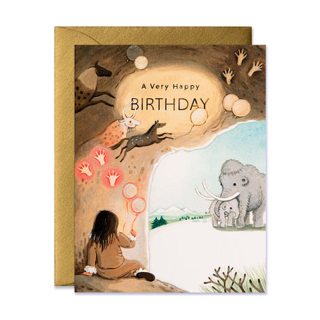 Caveman painting on cave walls with Mammoth and her baby standing birthday greeting card